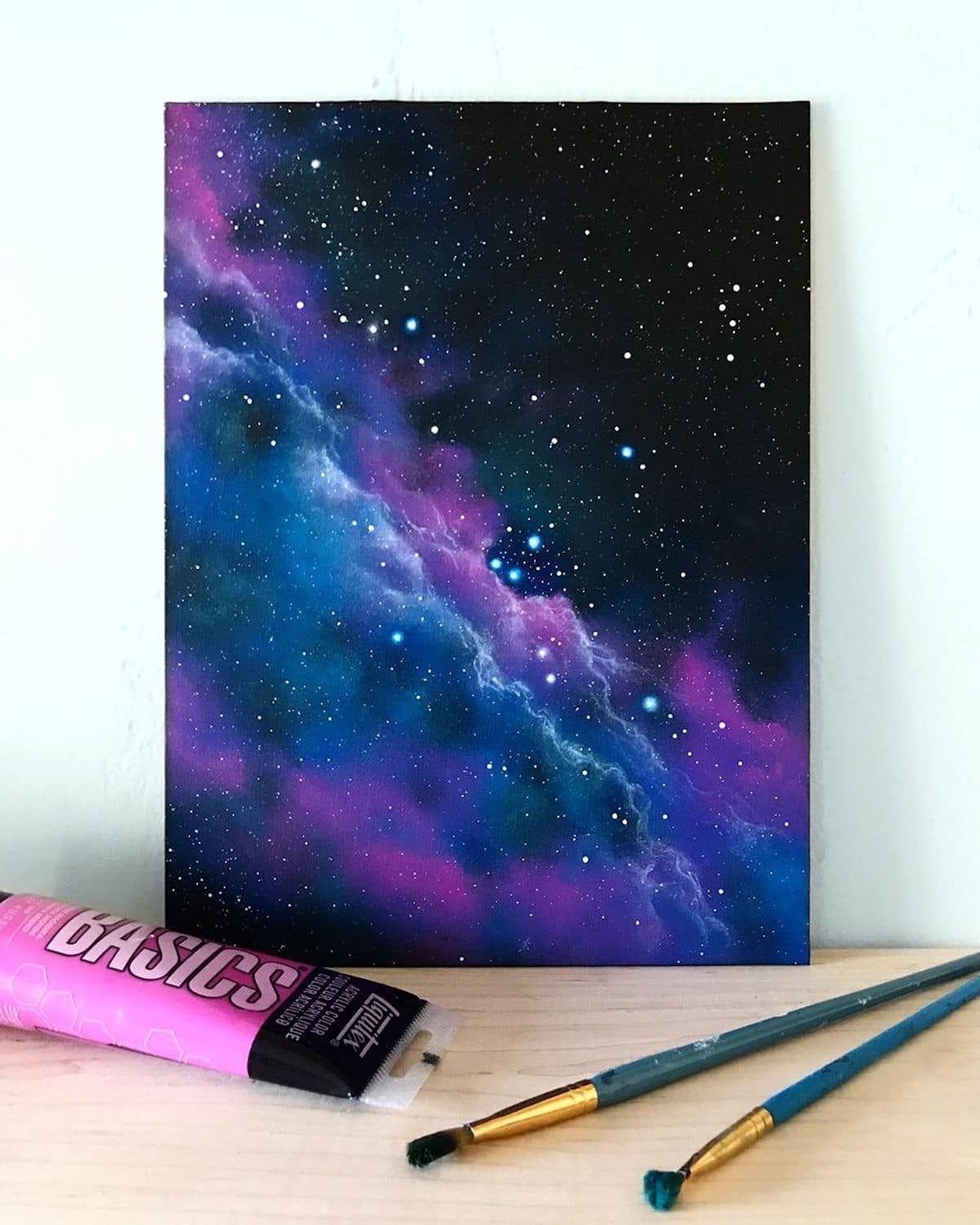 She uses acrylic paint to render scenes that are out of this world.