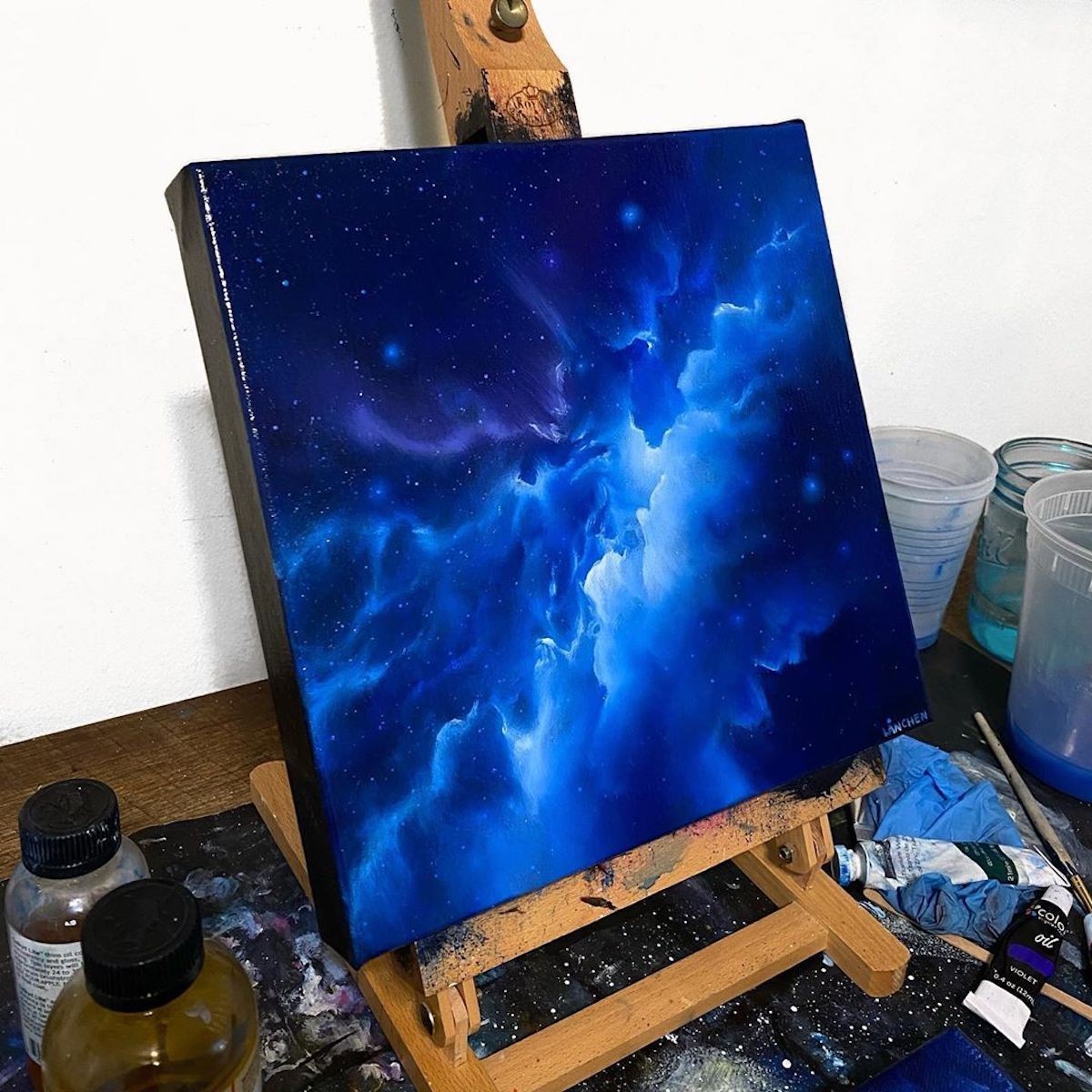 She uses acrylic paint to render scenes that are out of this world.