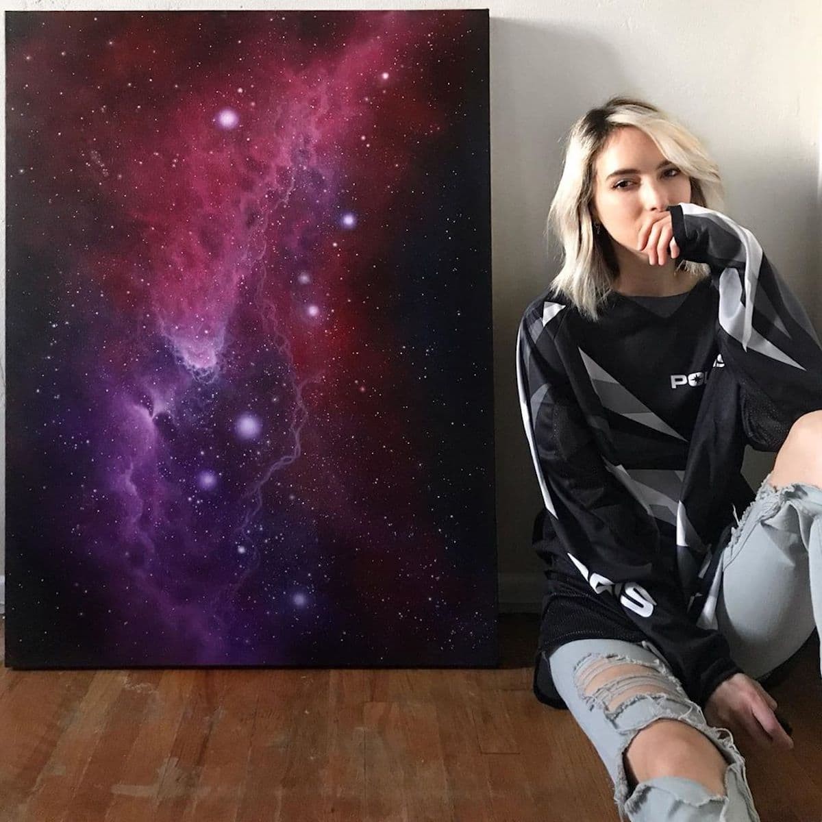 She uses acrylic paint to render scenes that are out of this world.