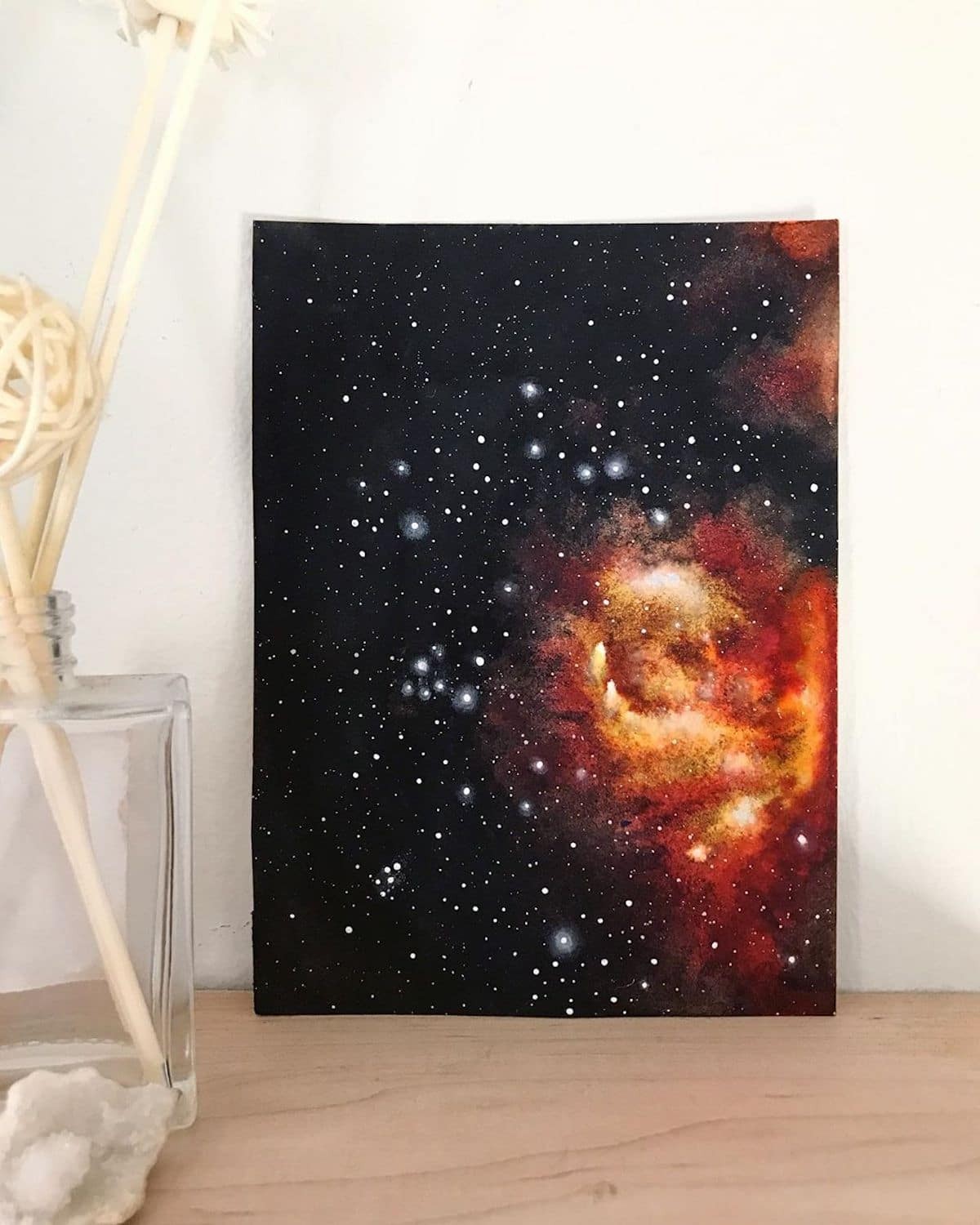 She uses acrylic paint to render scenes that are out of this world.